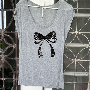 Lauren Conrad black sequin bow top size M